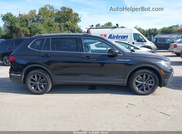 3VV3B7AX4PM061839 2023 VOLKSWAGEN TIGUAN Black Սալոնի հետևի տեսք