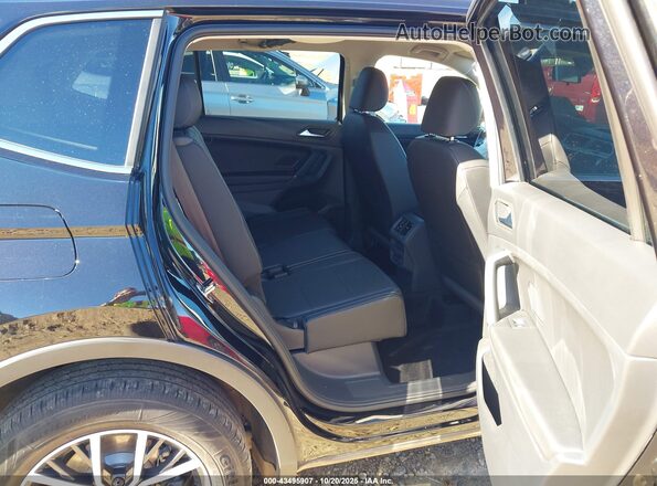 3VV3B7AXXLM033117 2020 VOLKSWAGEN TIGUAN Black Вид наклейки з VIN-кодом