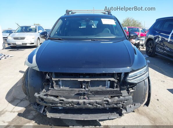 3VVCB7AX2RM024405 2024 VOLKSWAGEN TIGUAN Black Widok wnętrza z tyłu