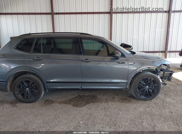 3VVCB7AX6NM074217 2022 VOLKSWAGEN TIGUAN Gray Vista interior trasera