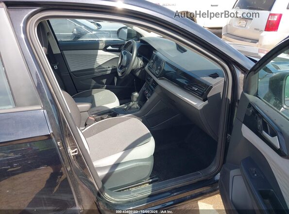 3VVCX7B27PM372623 2023 VOLKSWAGEN TAOS Black Front interior view