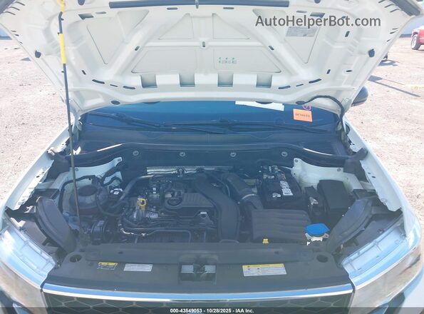 3VVDX7B23NM047985 2022 VOLKSWAGEN TAOS White Rear view