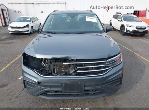 3VVFB7AX2RM010209 2024 VOLKSWAGEN TIGUAN Gray Vista interior trasera