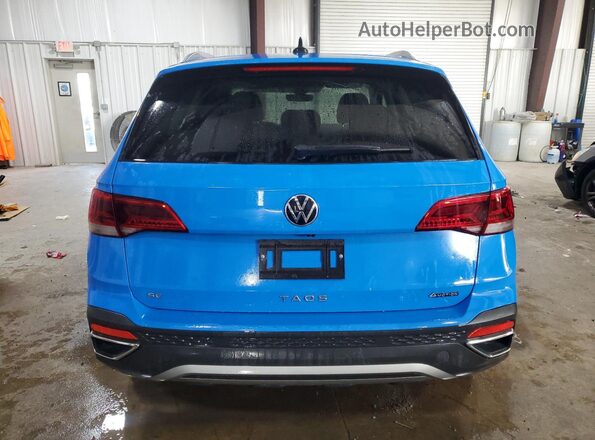 3VVNX7B22PM313990 2023 VOLKSWAGEN TAOS Синий Вид сзади