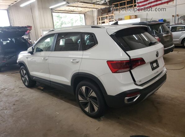 3VVUX7B29PM352958 2023 VOLKSWAGEN TAOS White Trasero izquierdo