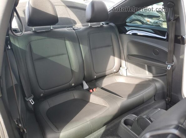 3VWJD7AT4JM727714 2018 VOLKSWAGEN BEETLE Black Rear seats view