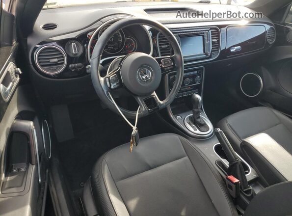 3VWJD7AT4JM727714 2018 VOLKSWAGEN BEETLE Black Dashboard view