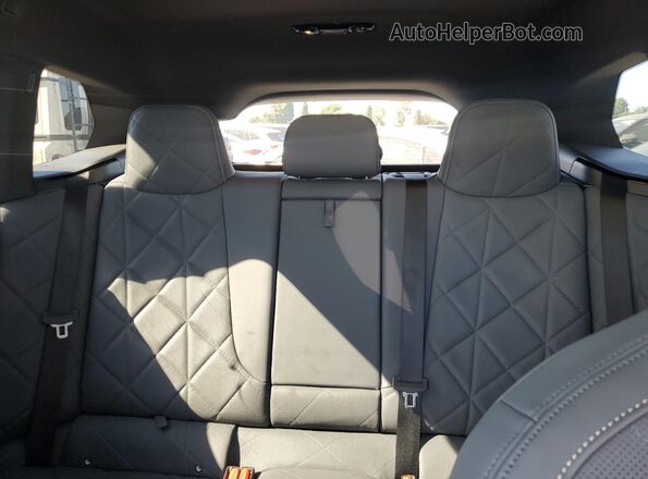 WB523CF07RCN65894 2024 BMW IX Gray Սալոնի հետևի տեսք