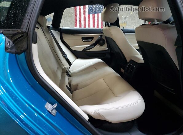 WBA4J3C57JBG96076 2018 BMW 4 SERIES Blue Vista interior trasera