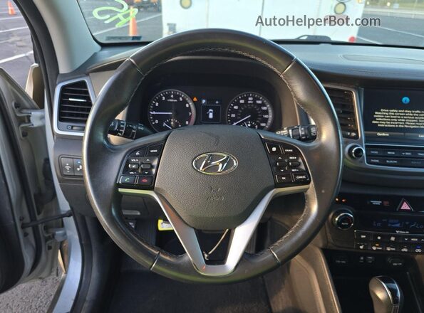 KM8J3CA24GU238767 2016 HYUNDAI TUCSON Silver 