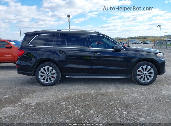 4JGDF6EE0KB220538 2019 MERCEDES-BENZ GLS 450 Black Widok wnętrza z tyłu