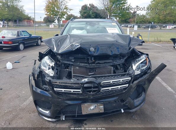 4JGDF7DE6JB089170 2018 MERCEDES-BENZ GLS 550 Black Widok wnętrza z tyłu