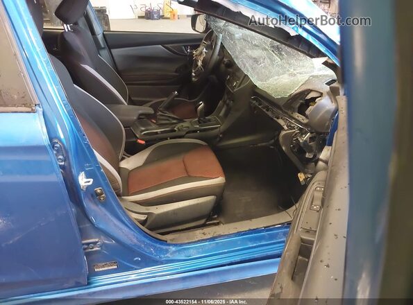 4S3GKAL65N3608150 2022 SUBARU IMPREZA Blue Vista interior delantera