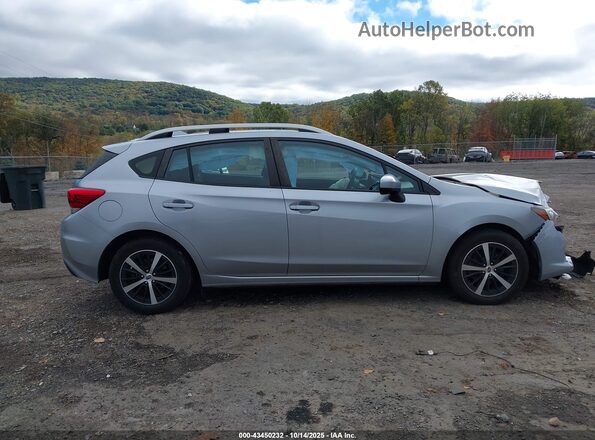 4S3GTAD61P3713752 2023 SUBARU IMPREZA Серебряный Вид задней части салона