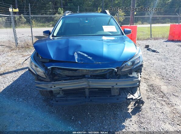 4S4BTADC3N3227615 2022 SUBARU OUTBACK Синий Вид задней части салона