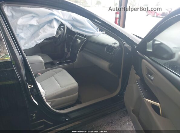 4T1BF1FKXGU259700 2016 TOYOTA LE Black Widok wnętrza z przodu
