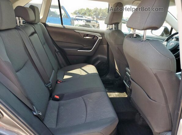 4T3RWRFV2PU107988 2023 TOYOTA LE Charcoal Vista interior trasera