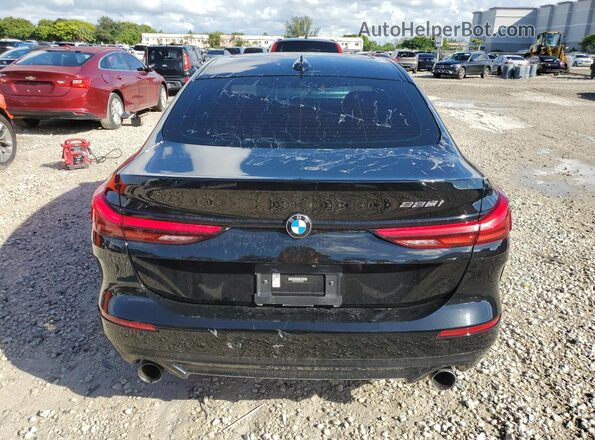 WBA53AK09M7H51692 2021 BMW 2 SERIES Black Front interior view