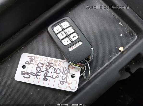 5FNRL6H64PB025005 2023 HONDA ODYSSEY White Առջևի վահանակի տեսք