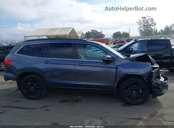 5FNYF5H26NB035381 2022 HONDA PILOT Gray Widok wnętrza z tyłu