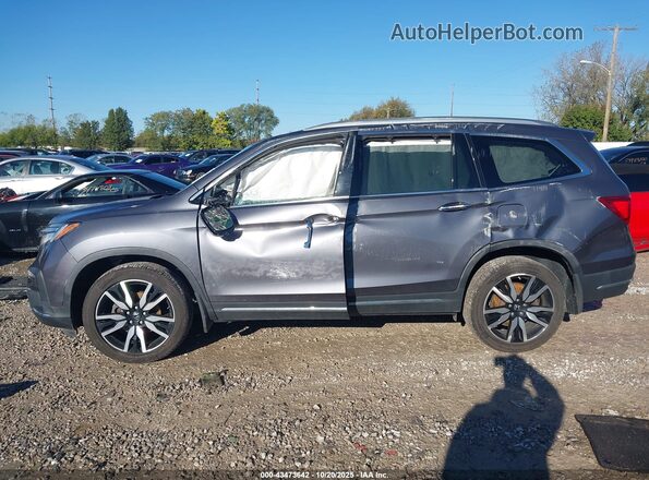 5FNYF6H01KB083323 2019 HONDA PILOT Gray Rear interior view