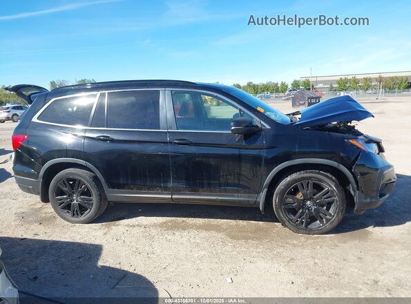 5FNYF6H28NB057646 2022 HONDA PILOT Черный Вид задней части салона