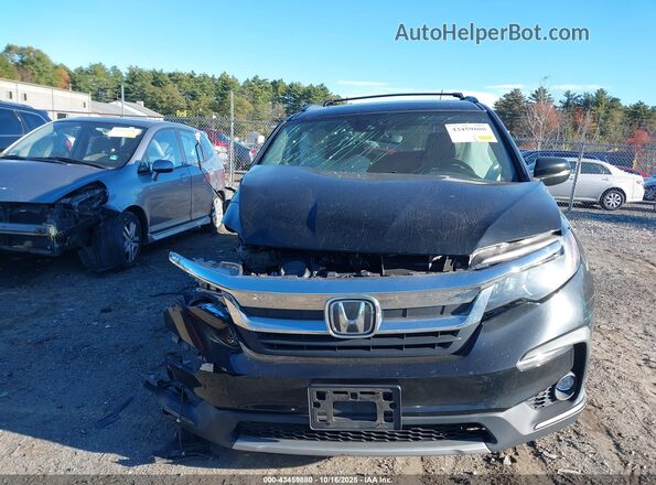 5FNYF6H5XLB045649 2020 HONDA PILOT Black Rear interior view
