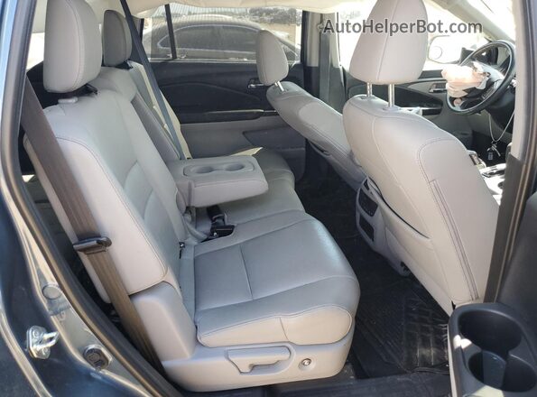5FNYF6H5XLB061835 2020 HONDA PILOT Blue Rear interior view
