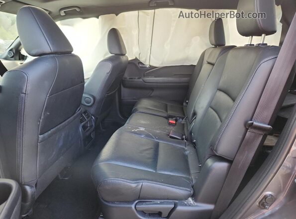 5FNYF7H51KB010065 2019 HONDA PASSPORT Gray Rear interior view