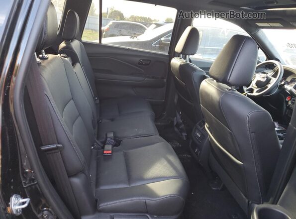 5FNYF8H03PB017374 2023 HONDA PASSPORT Черный Вид задней части салона