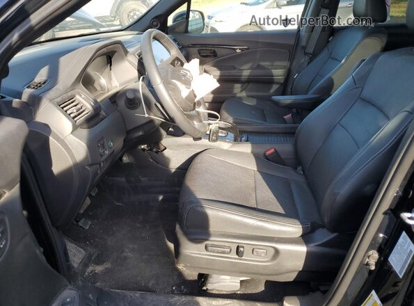 5FNYF8H03PB017374 2023 HONDA PASSPORT Черный Вид салона спереди