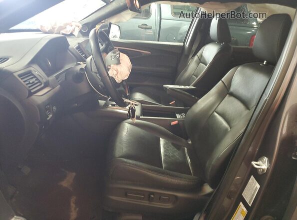 5FNYF8H59MB024014 2021 HONDA PASSPORT Gray Вид салону спереду