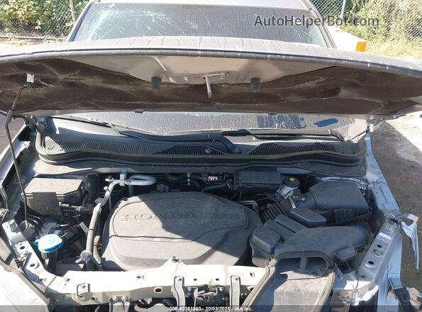 5FNYF8H5XMB015077 2021 HONDA PASSPORT Silver Rear view