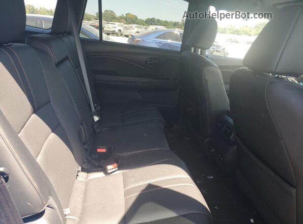 5FNYF8H63RB007483 2024 HONDA PASSPORT Blue Widok wnętrza z tyłu