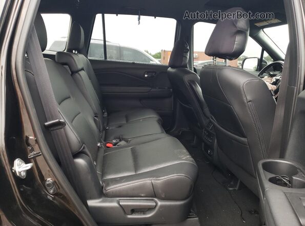 5FNYF8H90MB008190 2021 HONDA PASSPORT Black Vista de los asientos traseros