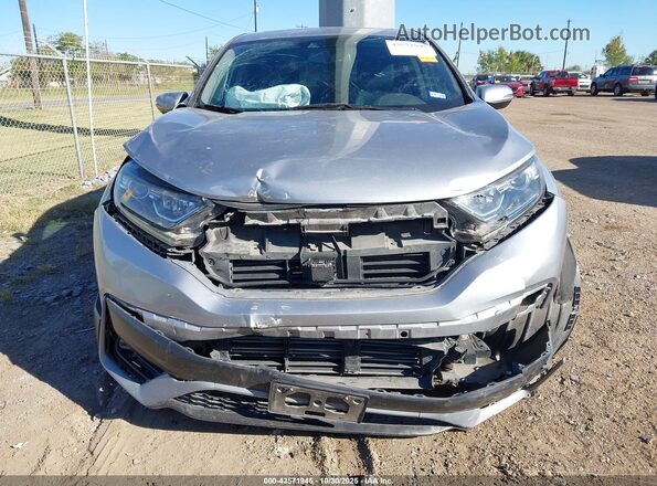 5J6RW1H82LL012492 2020 HONDA CR-V Серебряный Вид задней части салона