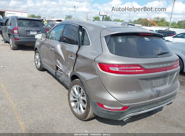 5LMCJ2C94JUL32736 2018 LINCOLN MKC Tan Задня ліва чверть