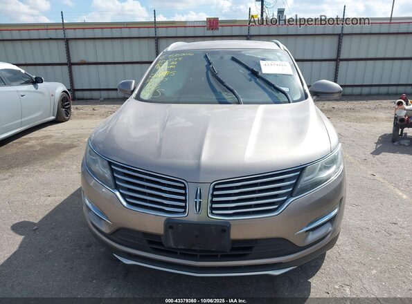 5LMCJ2C94JUL32736 2018 LINCOLN MKC Tan Вид щитка приладів