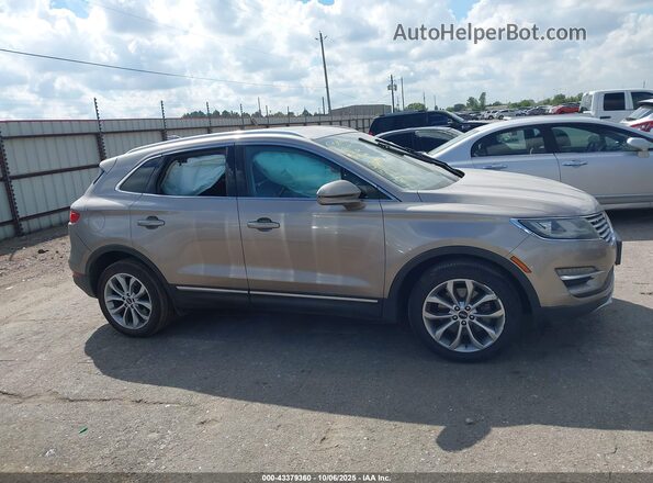 5LMCJ2C94JUL32736 2018 LINCOLN MKC Tan Вид задньої частини салону