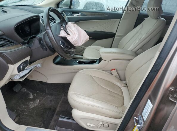 5LMCJ3D96JUL22486 2018 LINCOLN MKC Желто-коричневый Вид салона спереди