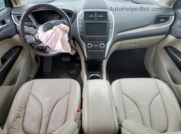 5LMCJ3D96JUL22486 2018 LINCOLN MKC Желто-коричневый Вид панели приборов