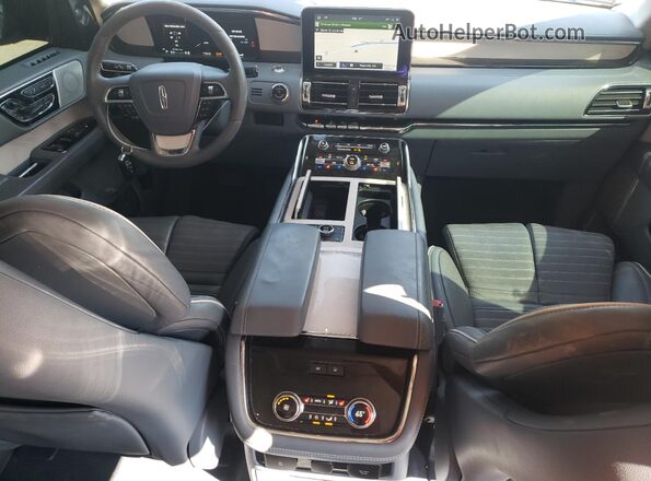5LMJJ2TT7LEL13565 2020 LINCOLN NAVIGATOR Синий Вид панели приборов