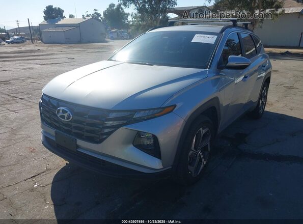 5NMJFCAE8NH104550 2022 HYUNDAI TUCSON Silver Vista tres cuartos delantera izquierda