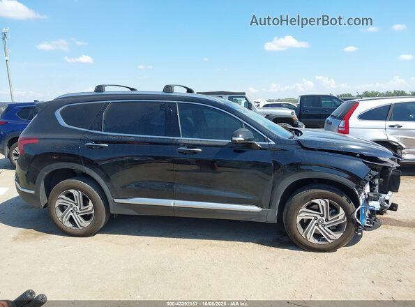 5NMS3DAJ8PH580106 2023 HYUNDAI SANTA FE Black Սալոնի հետևի տեսք