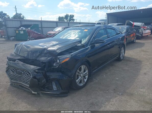 5NPE34AF0KH760121 2019 HYUNDAI SONATA Black Vista tres cuartos delantera izquierda