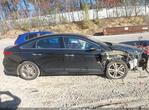5NPE34AF0KH808636 2019 HYUNDAI SONATA Черный Вид задней части салона