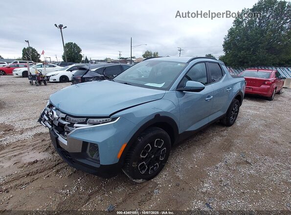 5NTJDDAF0NH027634 2022 HYUNDAI SANTA CRUZ Синий Передняя левая четверть