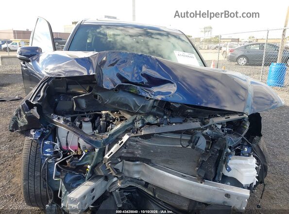 5TDADAB57SS012055 2025 TOYOTA HIGHLANDER HYBRID Blue Вид ззаду