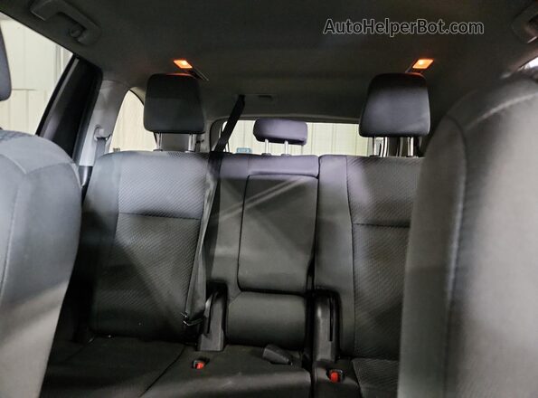 5TDBZRFH1KS975459 2019 TOYOTA LE Black Vista de los asientos traseros
