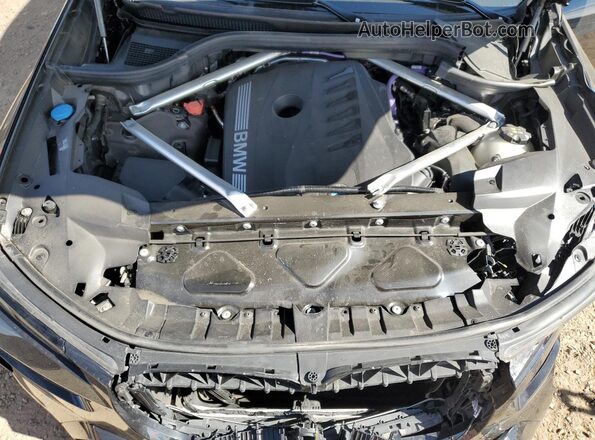 5UX23EM05S9X81702 2025 BMW X7 Черный Вид подкапотного пространства